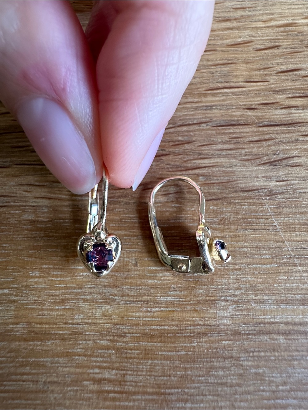 14k yellow gold heart motif leverback earrings with pink gemstone
